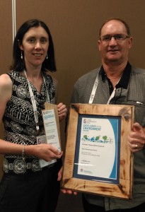 Paula Bosse & Neil Hibberson accepting the award